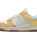 NIKE DUNK LOW WMNS "Soft Yellow"